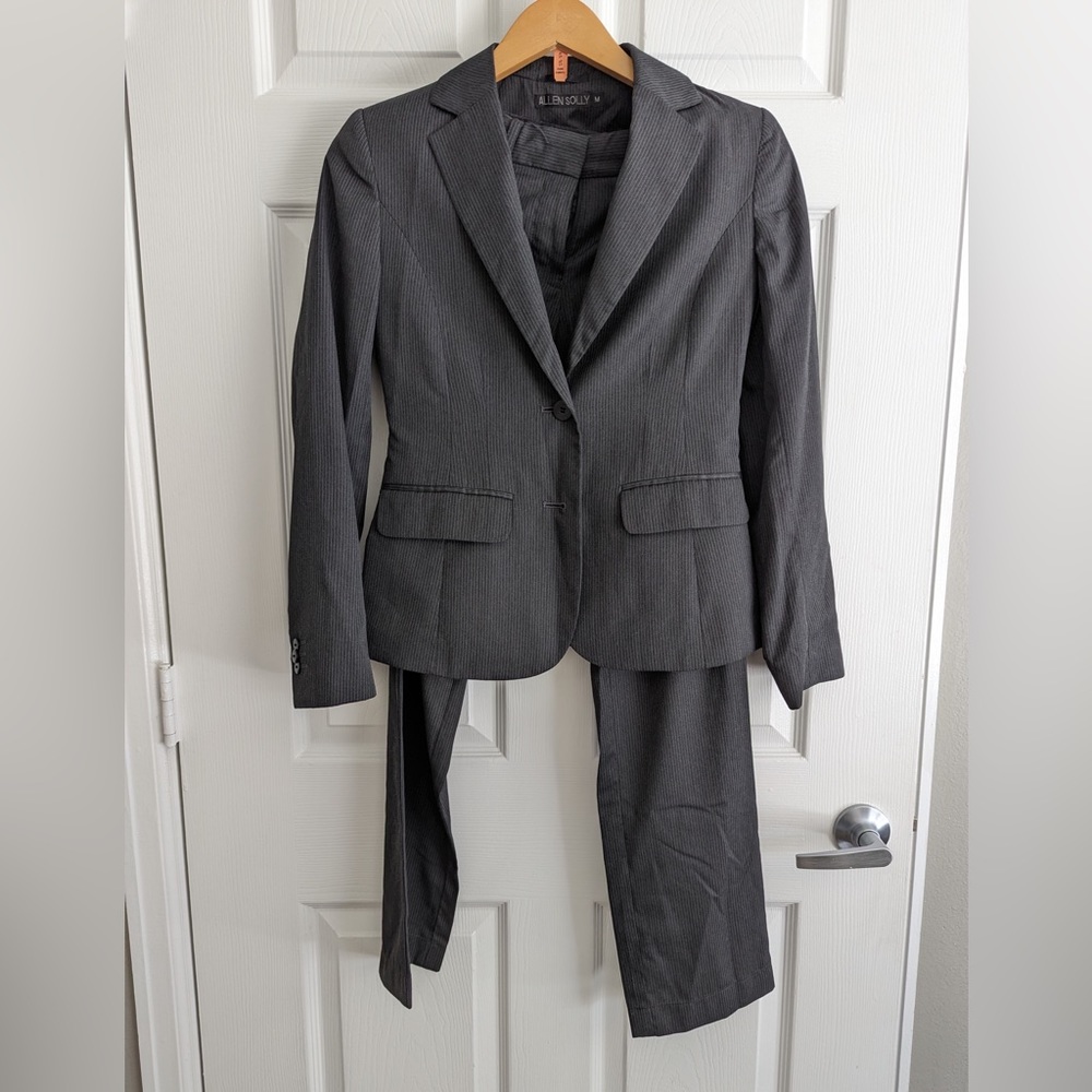 A business suit. Grey with white stripe.